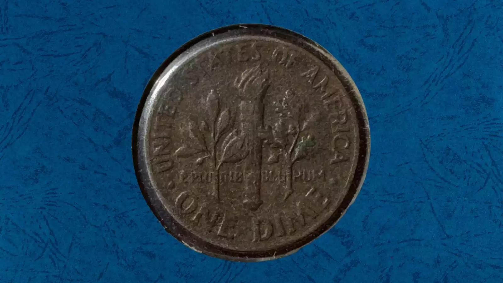 1971 dime missing clad layer error — copper-red obverse or reverse showing the exposed copper core